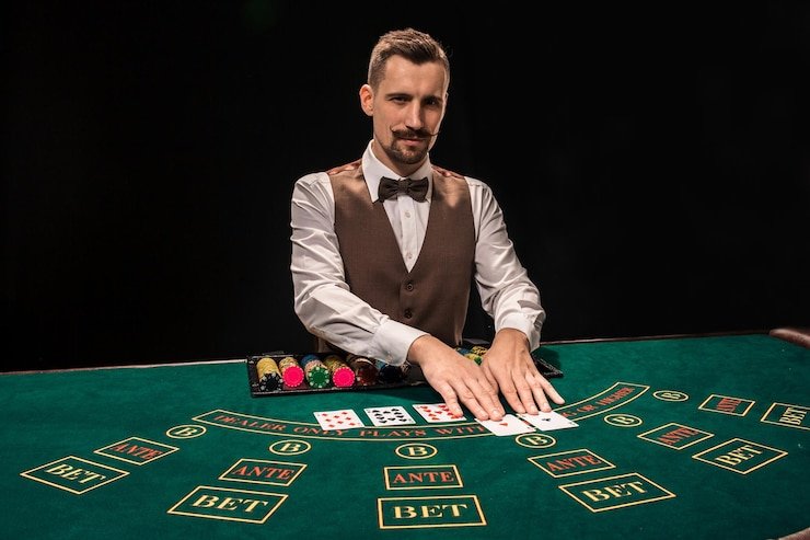 Tampilan permainan meja baccarat live dengan dealer dan papan skor
